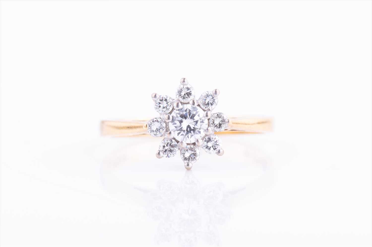 Lot 349 - An 18ct yellow gold and diamond daisy cluster...