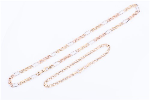 Lot 552 - A tri-coloured metal fancy-link necklace...