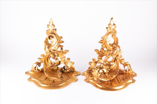 Lot 294 - A pair of gilt wall sconces with scroll...