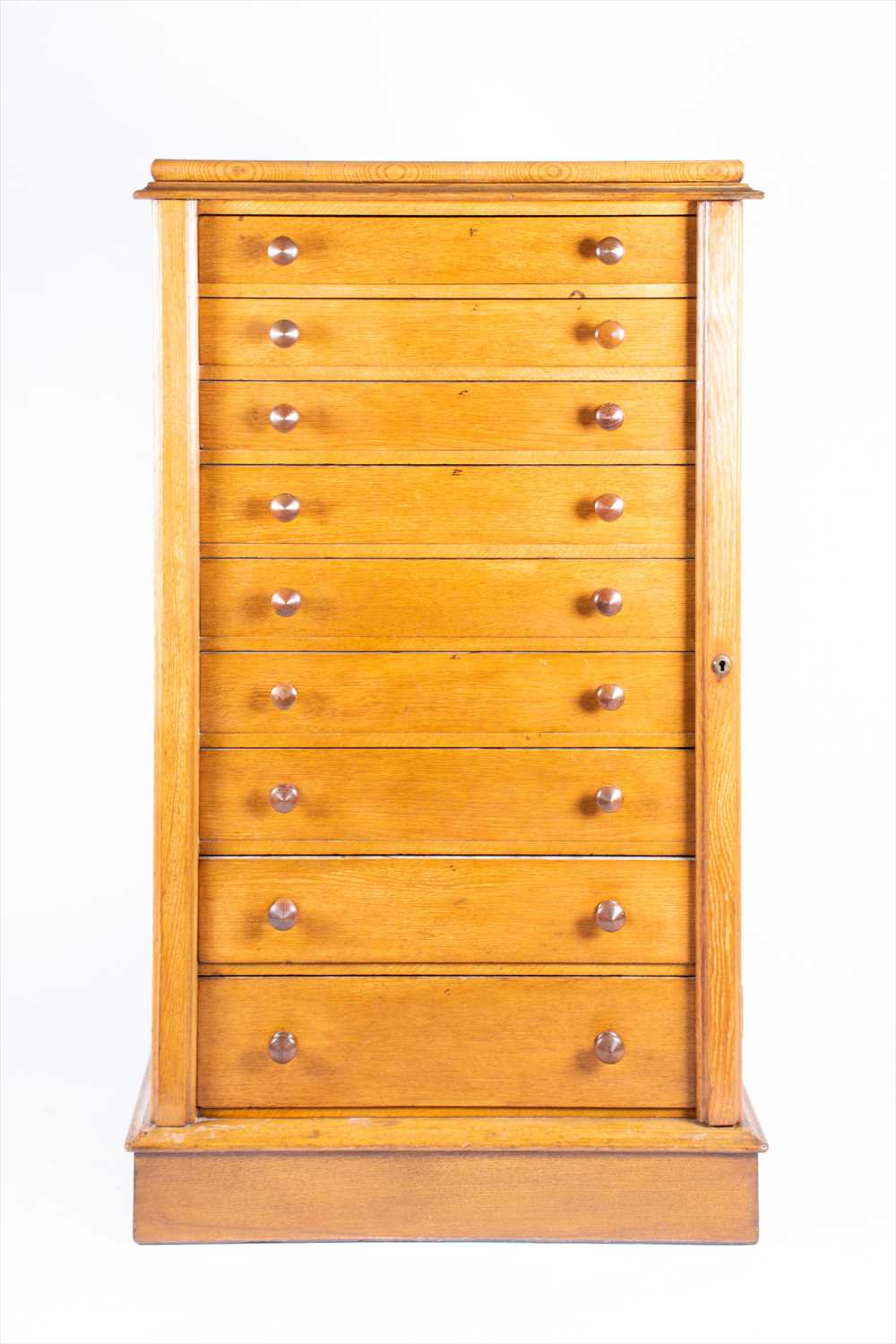 Lot 128 - A Victorian light oak Wellington chest...