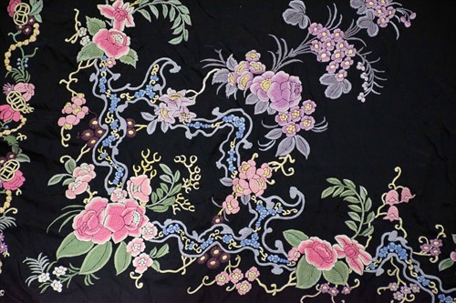 Lot 577 - A black silk manton de Manila shawl,...