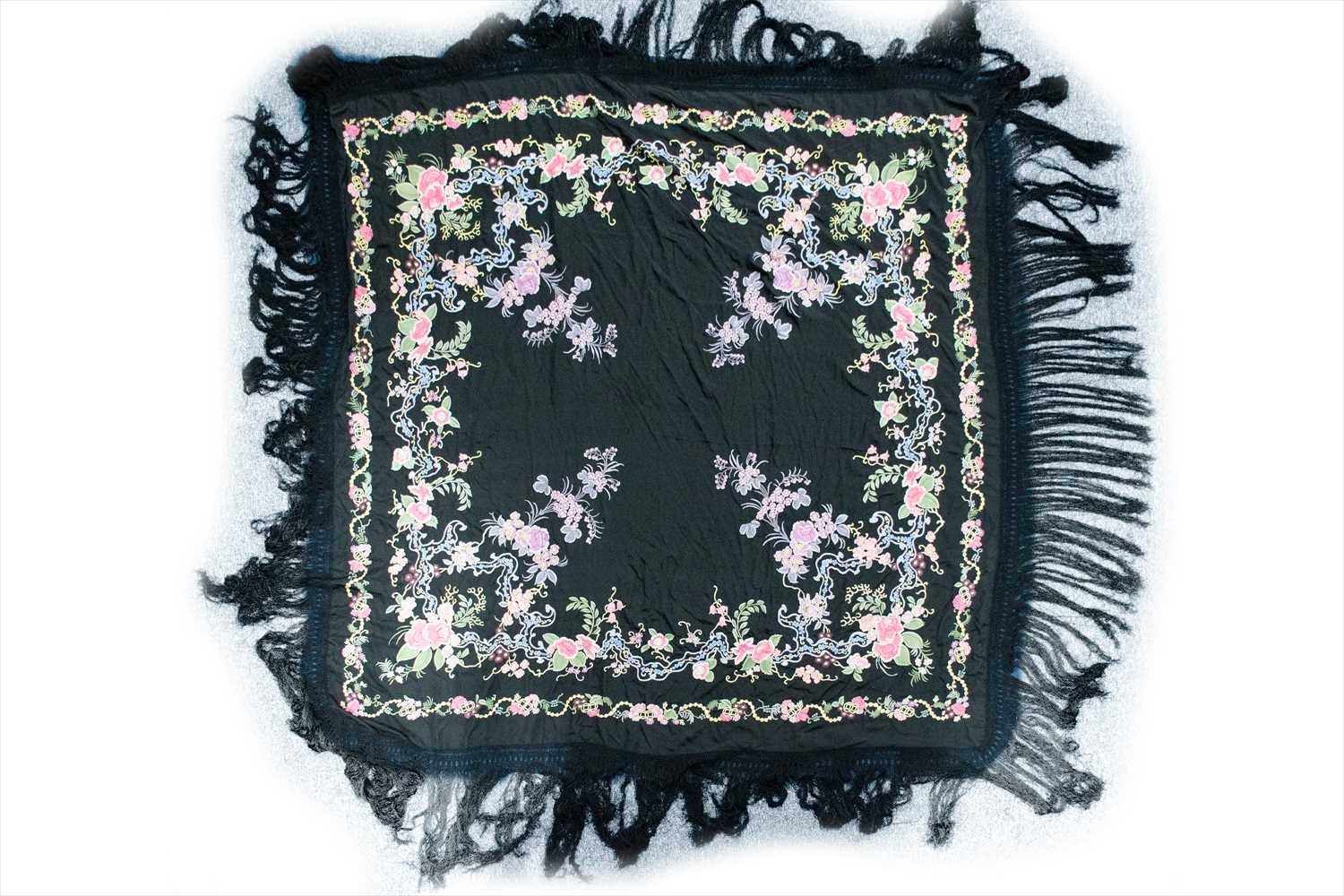 Lot 577 - A black silk manton de Manila shawl,...