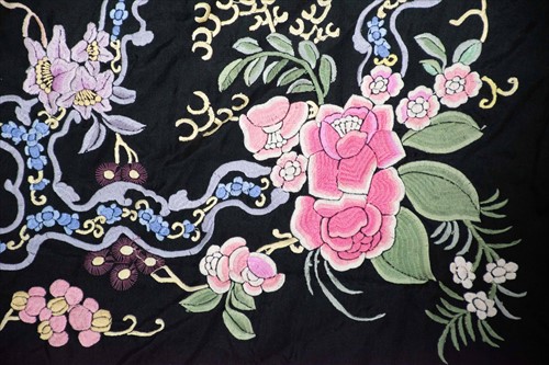 Lot 577 - A black silk manton de Manila shawl,...