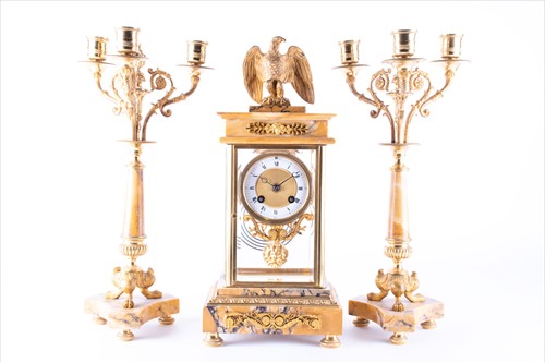 Lot 336 - A 19th century French Empire style clock...