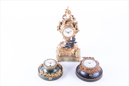 Lot 333 - Two small French ormolu mounted cartel clocks...