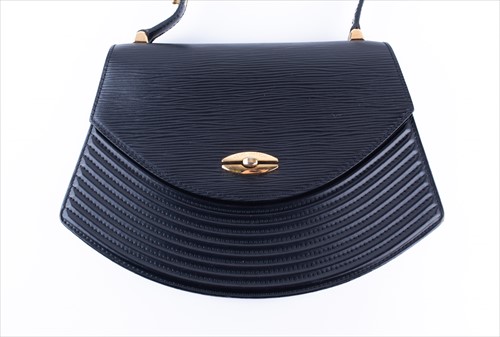 Lot 317 - A Louis Vuitton Tilsitt Pochette handbag in...