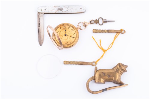 Lot 354 - A yellow metal ladies pocket watch the case...