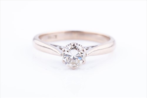 Lot 517 - An 18ct white gold and solitaire diamond ring...
