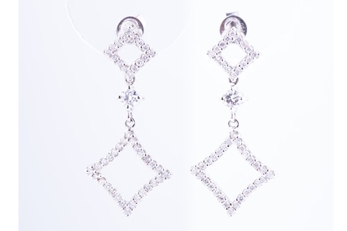 Lot 545 - A pair of 18 carat white gold diamond...
