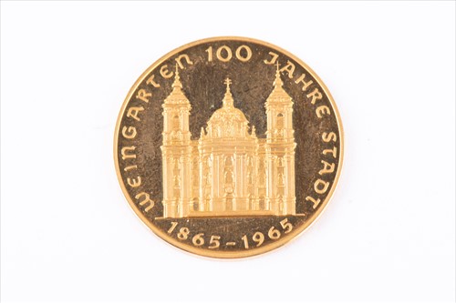 Lot 344 - A commemorative German gold coin commemorating...