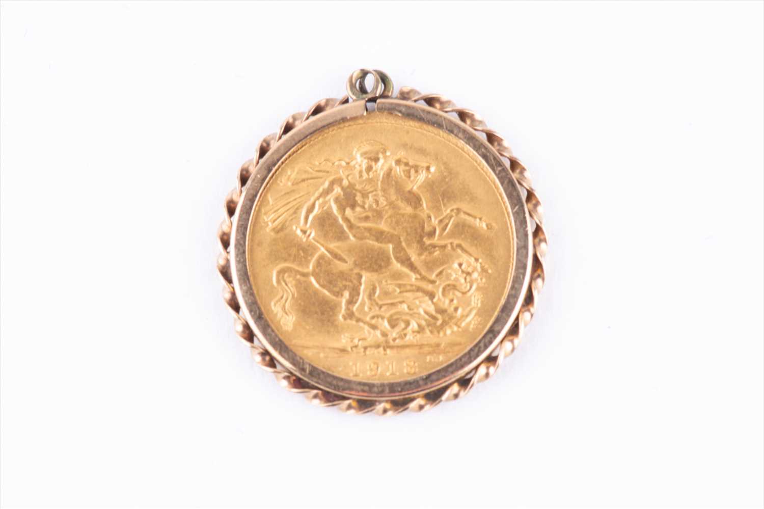 Lot 340 - A George V 1918 full sovereign in a 9ct