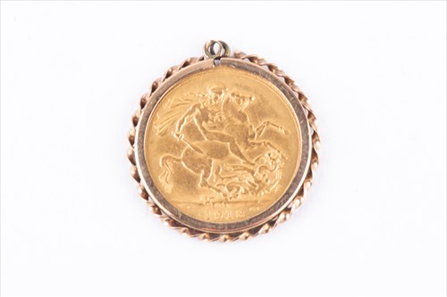 Lot 340 - A George V 1918 full sovereign in a 9ct yellow...