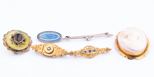 Lot 471 - A sapphire and diamond bar brooch stamped 15ct...