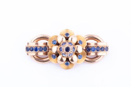 Lot 317 - A 9 carat yellow gold and sapphire brooch, the...