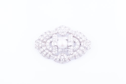 Lot 486 - A diamond and pearl brooch the stylised oval...