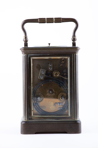 Lot 327 - A brass chiming and repeating carriage clock...