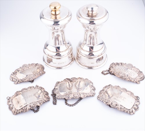 Lot 368 - A group of five silver decanter labels...