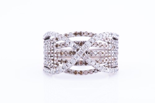 Lot 446 - A white metal and diamond crossover-style band...