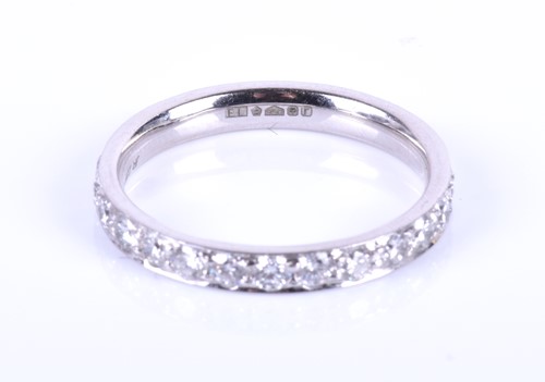 Lot 376 - A platinum and diamond eternity ring, inset...
