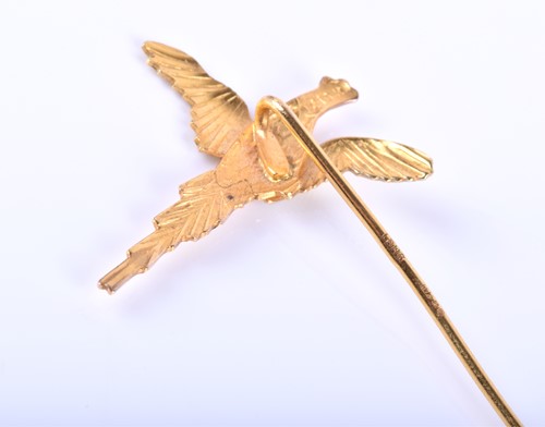 Lot 381 - A yellow metal novelty tie-pin, in the form of...