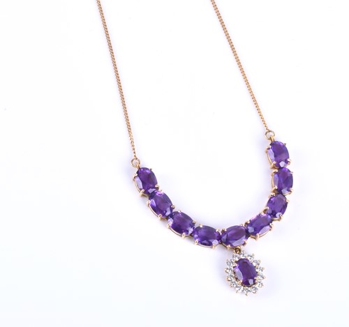 Lot 394 - A 14ct yellow gold, amethyst and CZ necklace,...