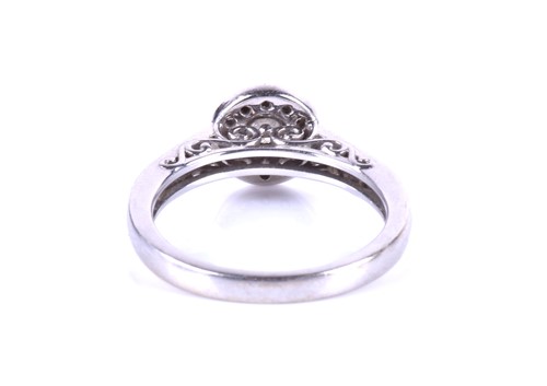 Lot 423 - A white gold and diamond engagement ring,...