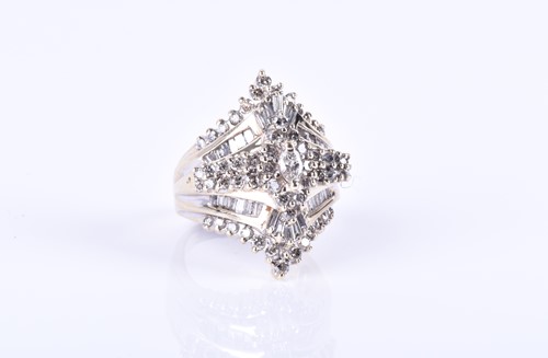 Lot 426 - A yellow metal and diamond cluster ring, the...