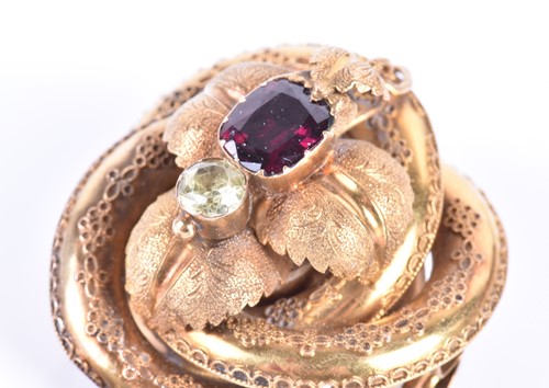 Lot 47 - A Victorian yellow gold and garnet brooch of...