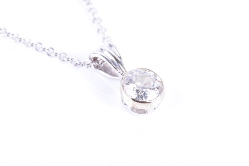 Lot 52 - An 18ct white gold and solitaire diamond...