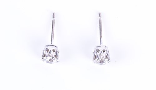 Lot 114 - A pair of old round-cut solitaire diamond stud...