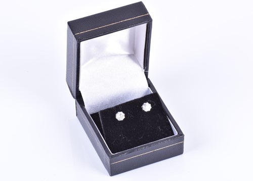 Lot 114 - A pair of old round-cut solitaire diamond stud...
