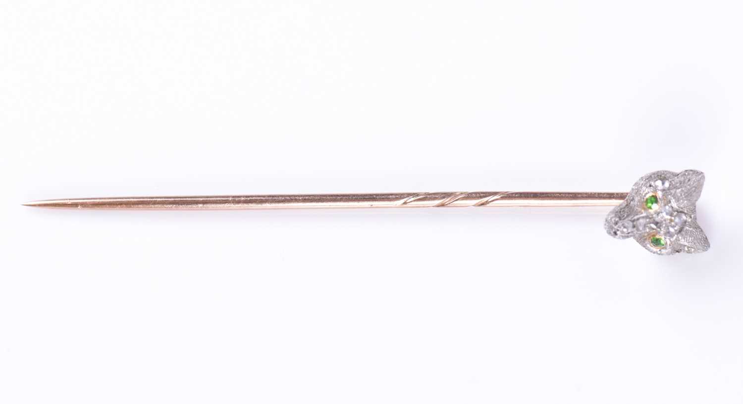 Lot 18 - A diamond-set fox head stick pin with...