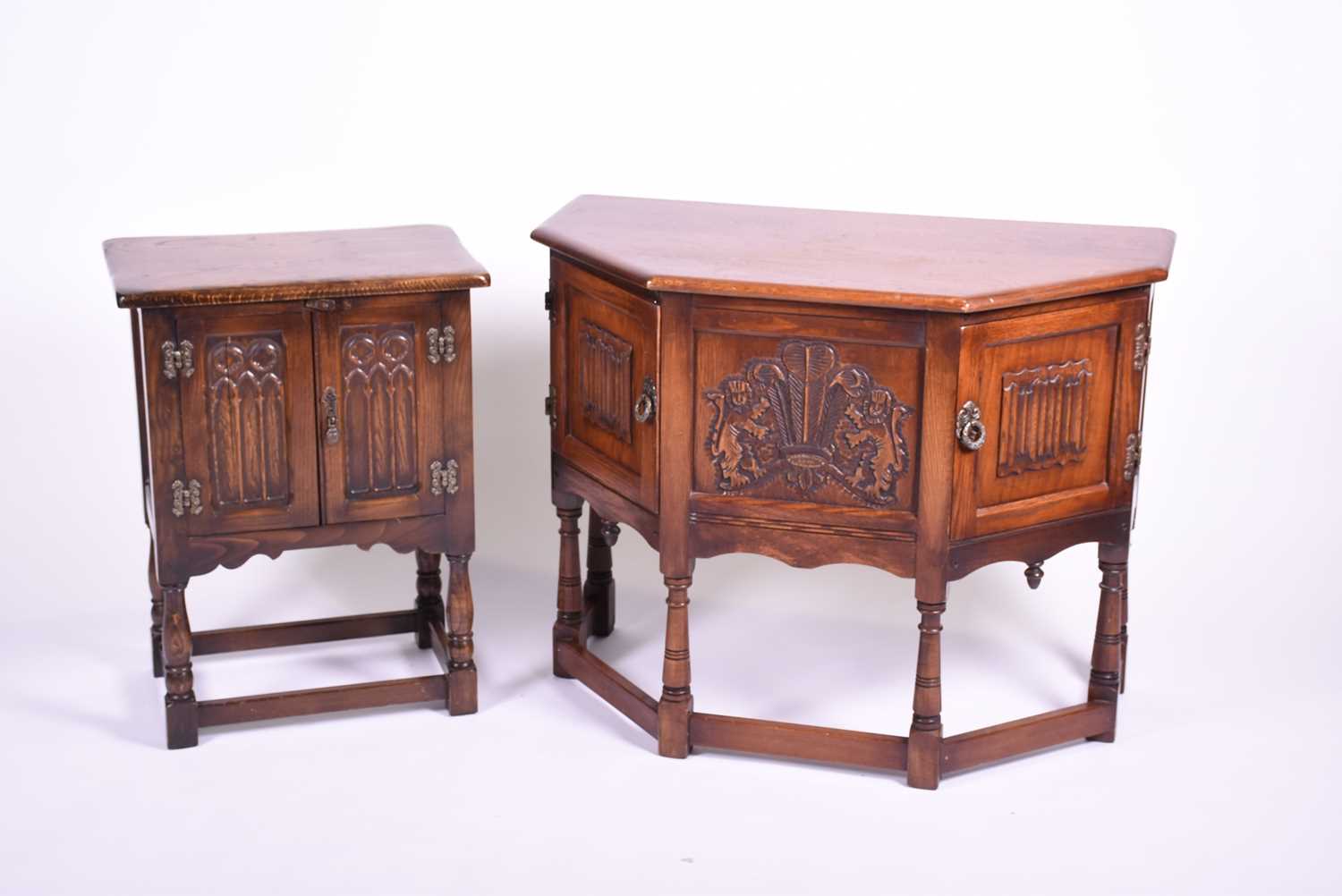 Lot 516 - An Old Charm oak side cabinet, the front...