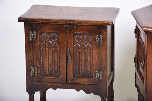 Lot 516 - An Old Charm oak side cabinet, the front...