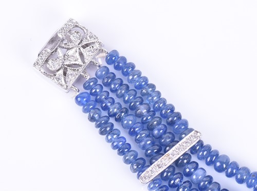 Lot 77 - A sapphire and diamond bracelet four rows of...