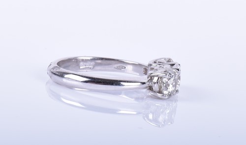 Lot 111 - An 18ct white gold and diamond ring set with...
