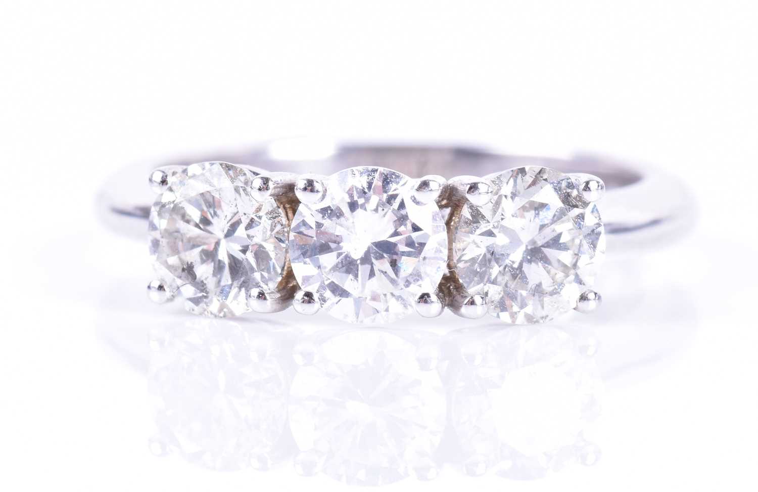 Lot 111 - An 18ct white gold and diamond ring set with...