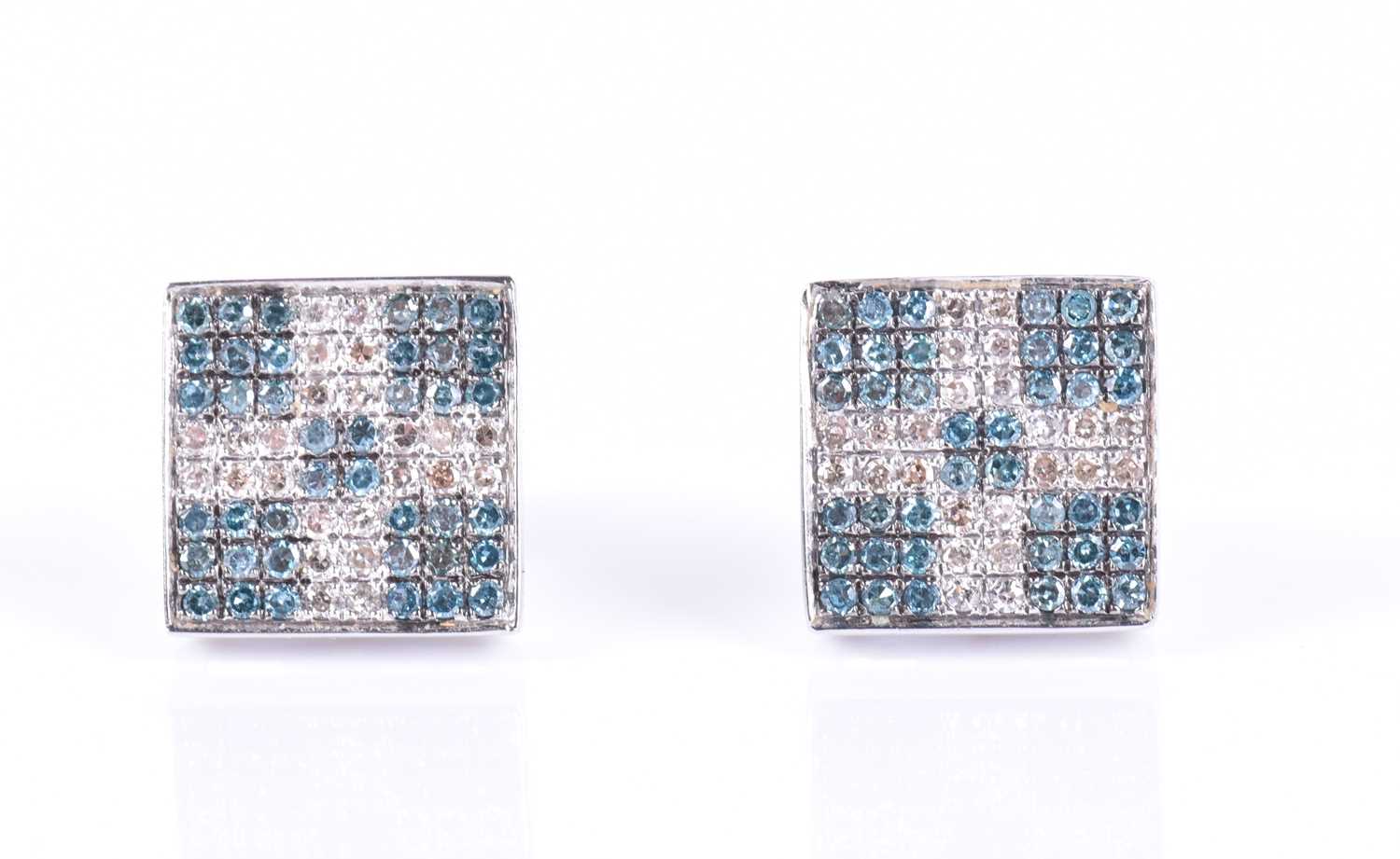 Lot 146 - A pair of 14ct white gold, blue and white...