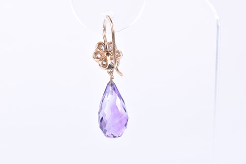 Lot 152 - A pair of diamond and amethyst drop earrings...