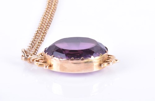 Lot 155 - A Victorian yellow gold and amethyst glass...