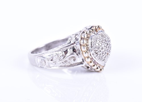 Lot 187 - An unusual silver and diamond ring the...