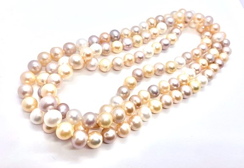 Lot 218 - An 8-8.5mm Pink, cream and light grey...