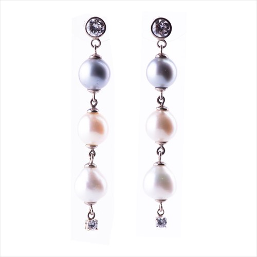 Lot 398 - A pair of diamond and pearl drop earrings each...