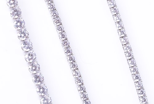 Lot 273 - A silver and cubic zirconia line necklace set...