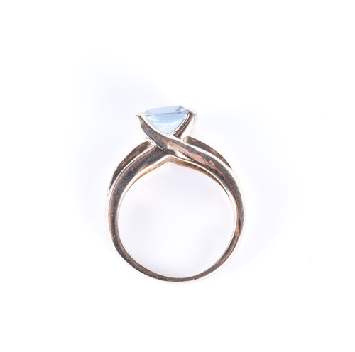 Lot 274 - A 9ct yellow gold, diamond, and blue topaz...