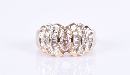 Lot 290 - A 14ct yellow gold and diamond ring centred...