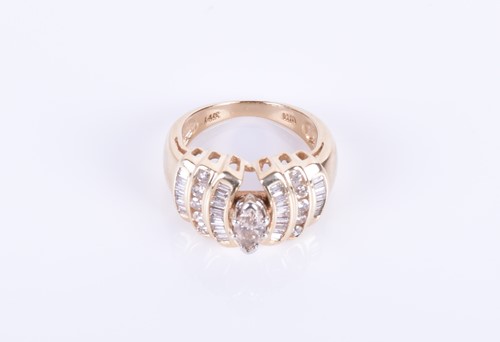 Lot 290 - A 14ct yellow gold and diamond ring centred...