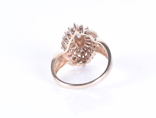 Lot 294 - A yellow metal and diamond marquise-shaped...