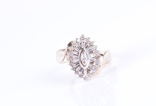 Lot 294 - A yellow metal and diamond marquise-shaped...