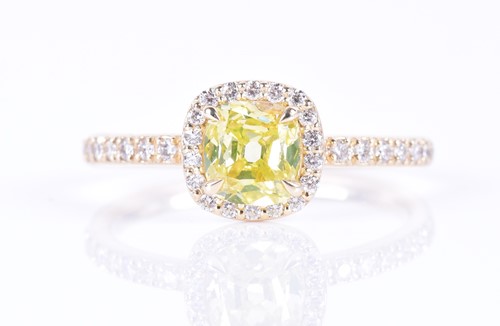 Lot 653 - A 14ct yellow gold and yellow diamond halo...